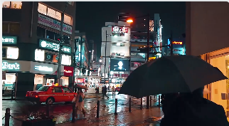 雨后街景日本夜晚人群走路视角视频素材